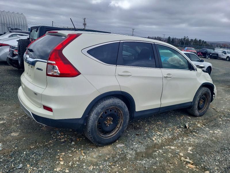 Photo 3 from auction – 2015 HONDA CR-V with VIN 2HKRM4H42FH123420