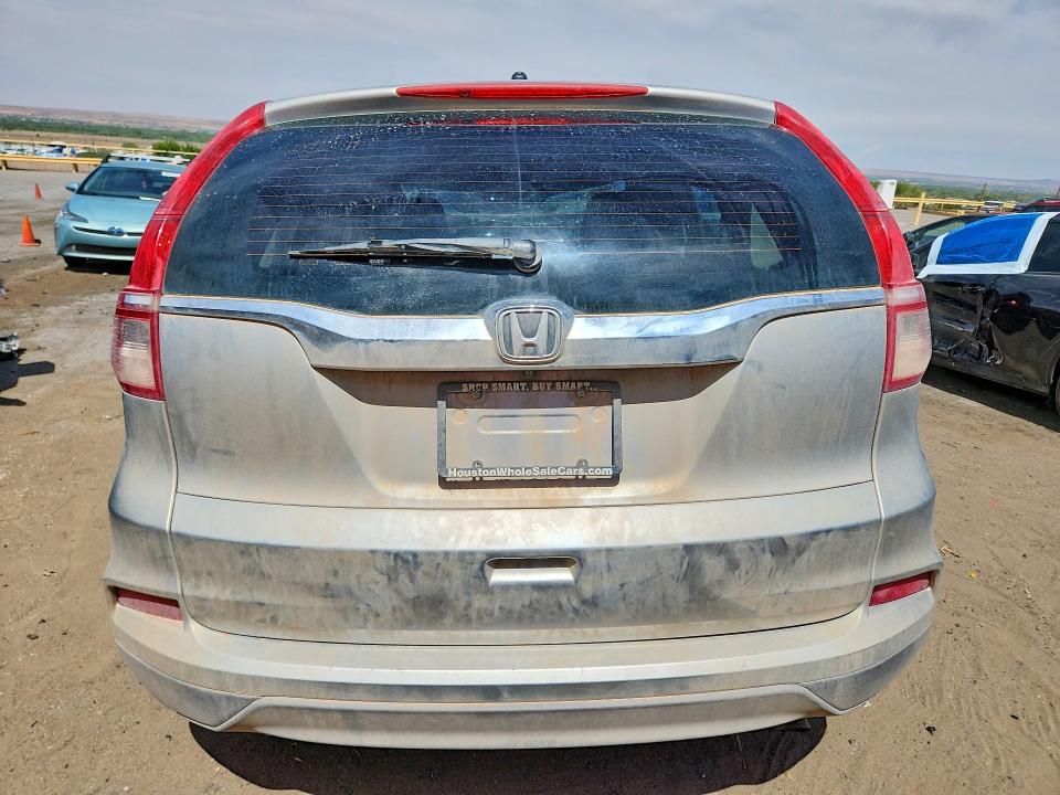 Photo 6 from auction – 2015 HONDA CR-V with VIN 3CZRM3H35FG706245