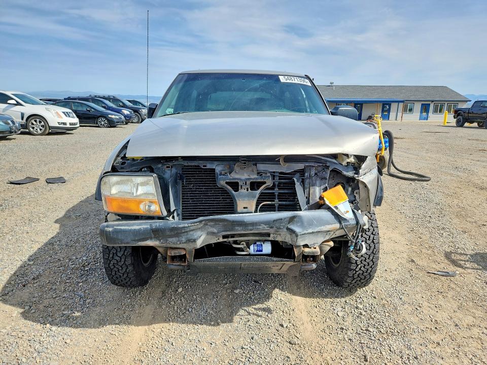 Photo 5 from auction – 2005 GMC JIMMY with VIN 1GKCT18X65K104004