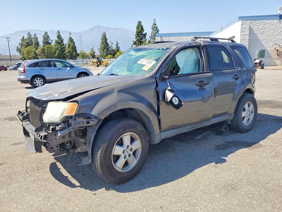FORD ESCAPE 2010 with VIN 1FMCU9D77AKC28091 - Photo from auction