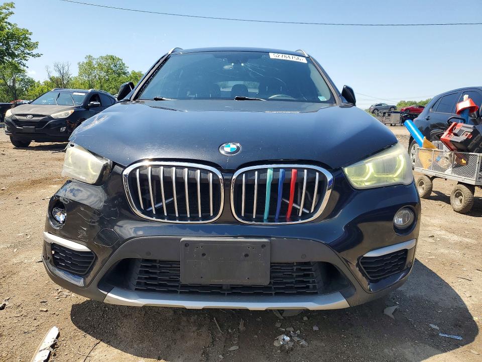 Photo 5 from auction – 2017 BMW X1 with VIN WBXHT3C32H5F72788