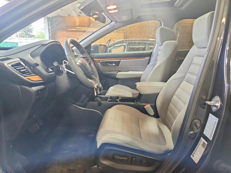 Photo 7 from auction – 2018 HONDA CR-V with VIN 2HKRW2H59JH623008