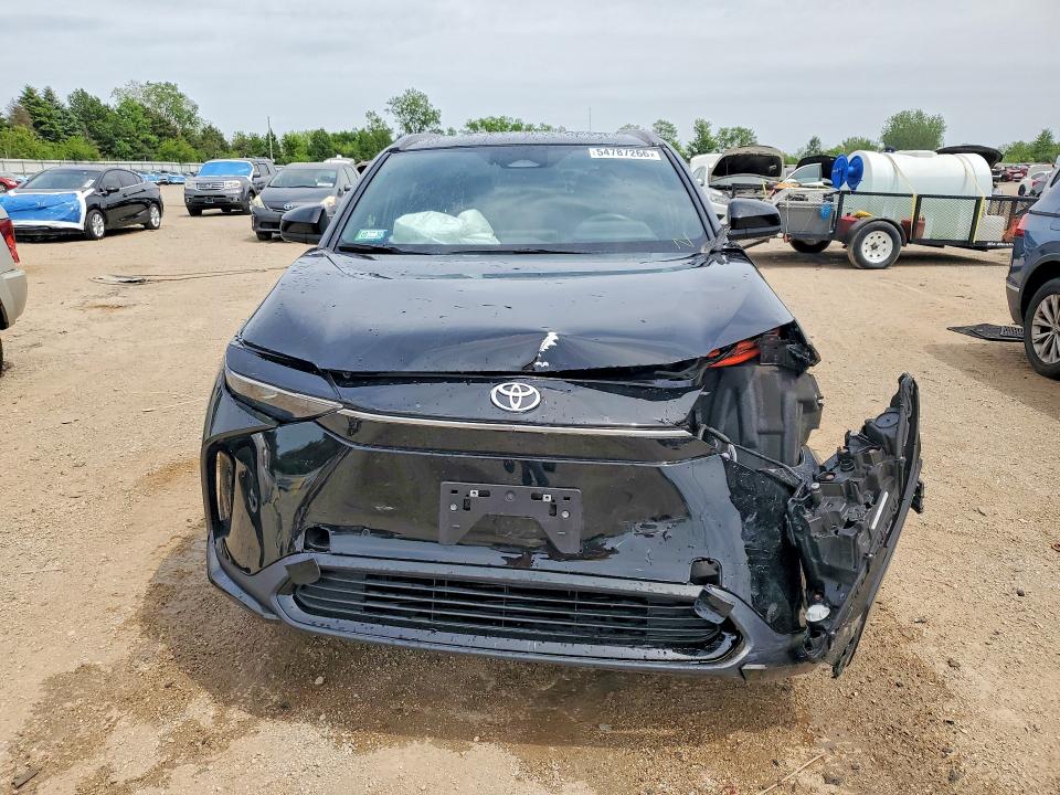 Photo 5 from auction – 2023 TOYOTA BZ4X with VIN JTMABACA0PA014171