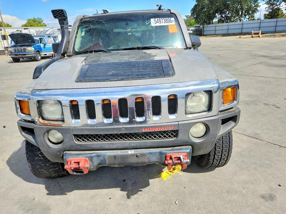 Photo 5 from auction – 2009 HUMMER H3 with VIN 5GTEN13E598118296