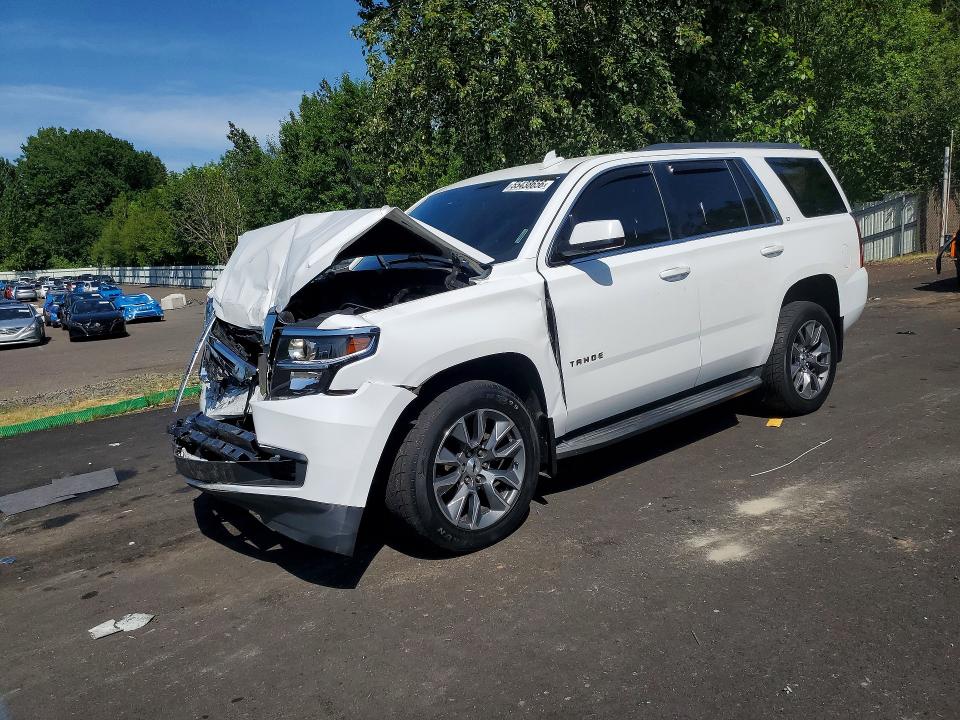 CHEVROLET TAHOE 2015 with VIN 1GNSCBKC9FR701974 - Photo from auction