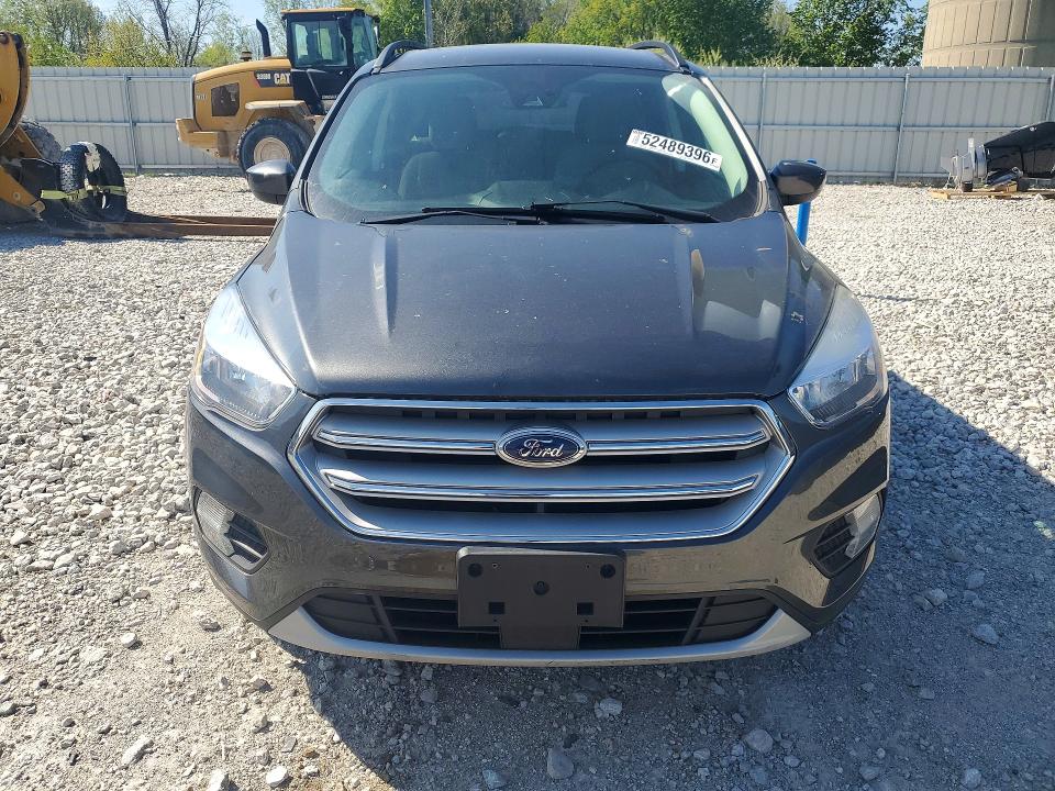 Photo 5 from auction – 2018 FORD ESCAPE with VIN 1FMCU9GD6JUC11563