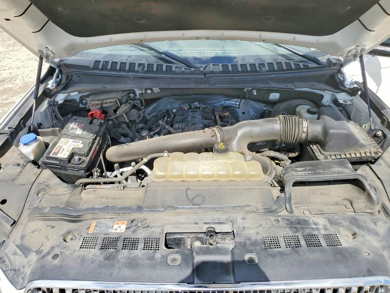 Photo 12 from auction – 2021 LINCOLN NAVIGATOR with VIN 5LMJJ2LT8MEL18419