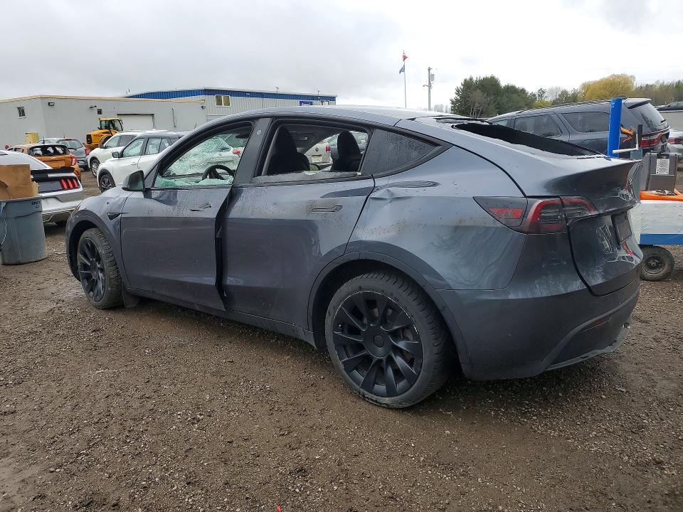 Photo 2 from auction – 2023 TESLA MODEL Y with VIN LRWYGDEE4PC163220