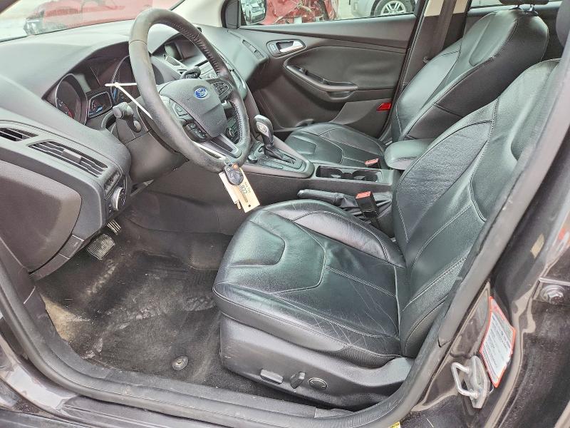 Photo 7 from auction – 2015 FORD FOCUS with VIN 1FADP3F28FL348312
