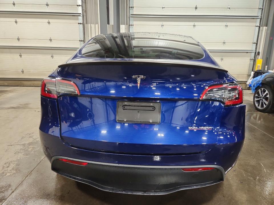Photo 6 from auction – 2023 TESLA MODEL Y with VIN 7SAYGDEF5PF827347