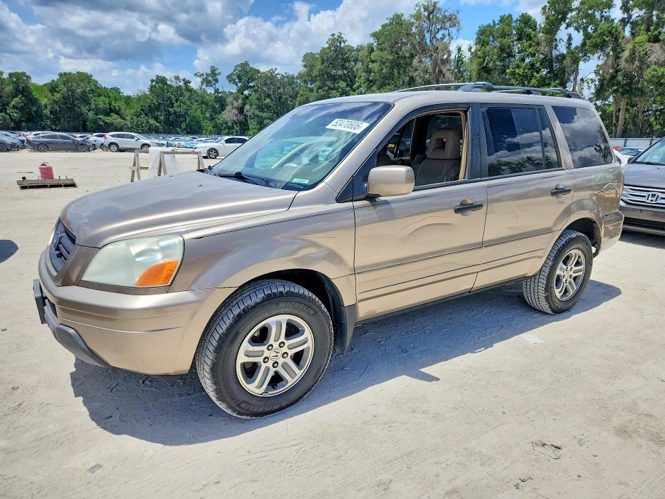 HONDA PILOT 2004 with VIN 2HKYF18594H594961 - Photo from auction