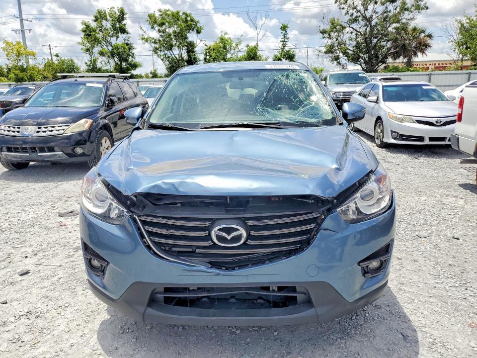 Photo 5 from auction – 2016 MAZDA CX-5 with VIN JM3KE2CY4G0842462