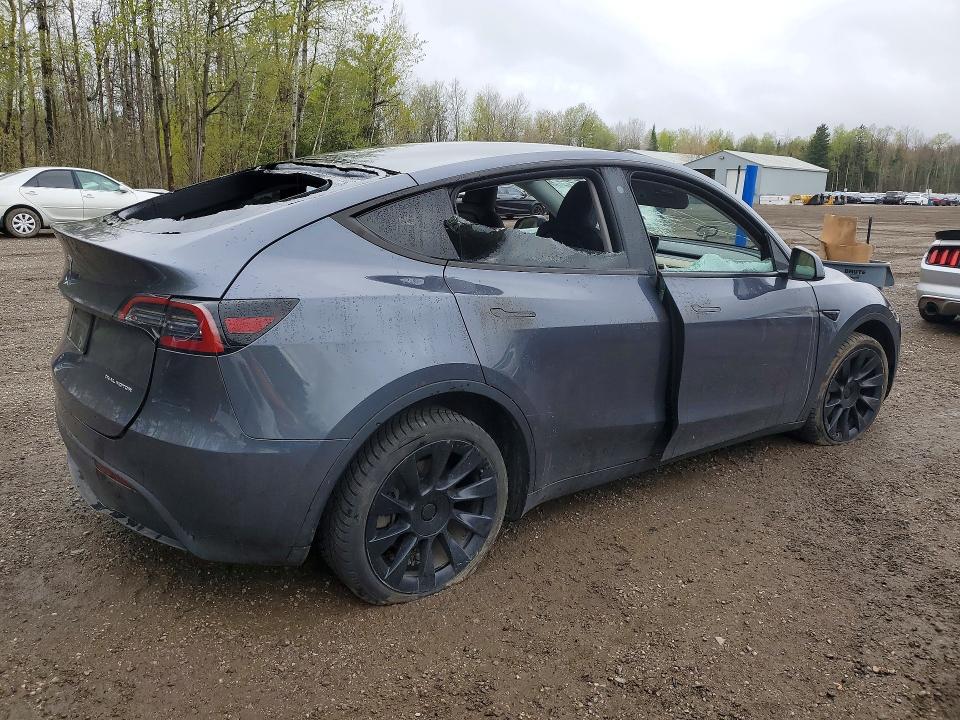 Photo 3 from auction – 2023 TESLA MODEL Y with VIN LRWYGDEE4PC163220