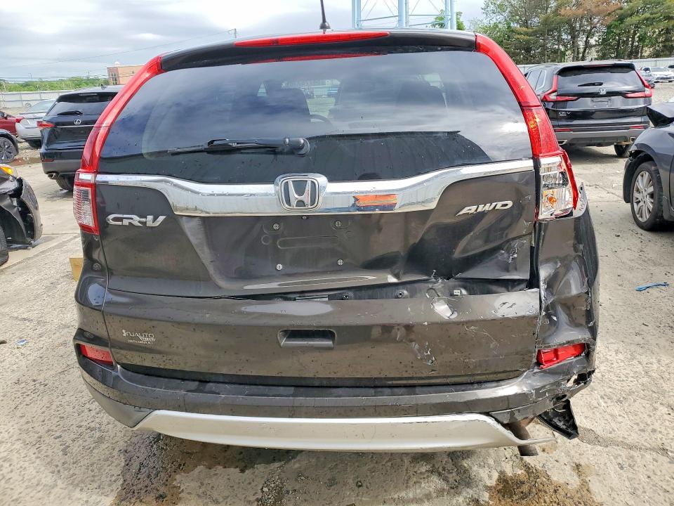 Photo 6 from auction – 2015 HONDA CR-V with VIN 2HKRM4H5XFH707489