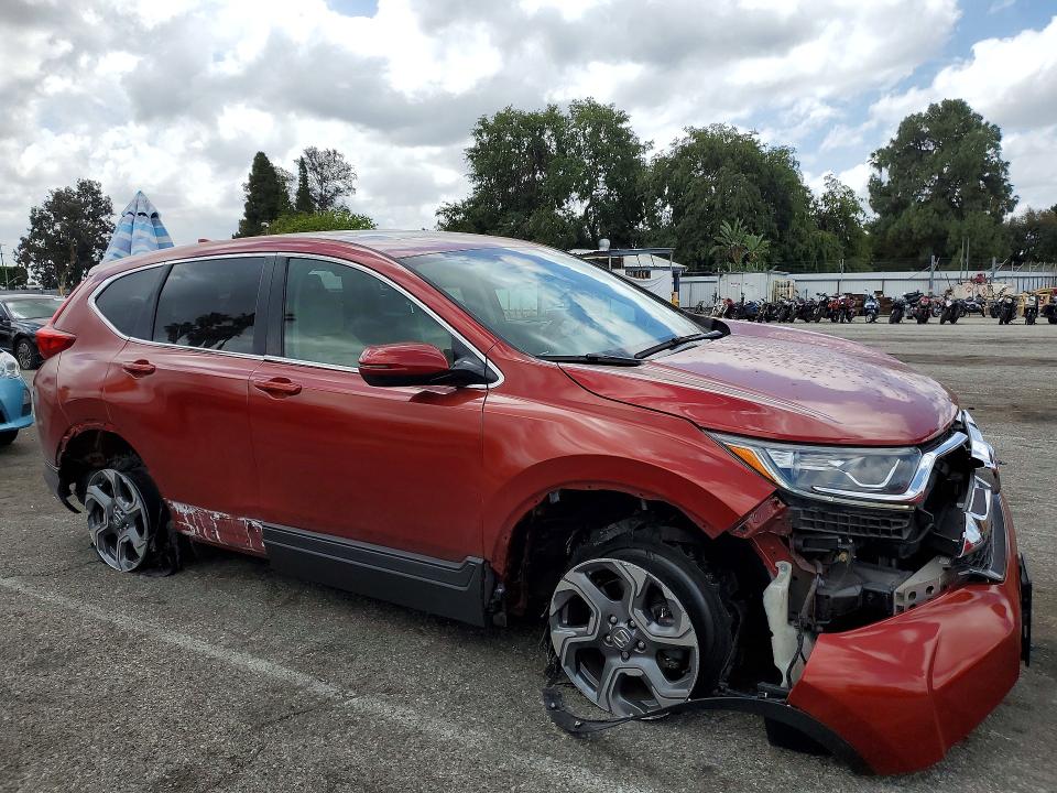 Снимка 4 от търг – 2018 HONDA CR-V с VIN 2HKRW1H55JH522932