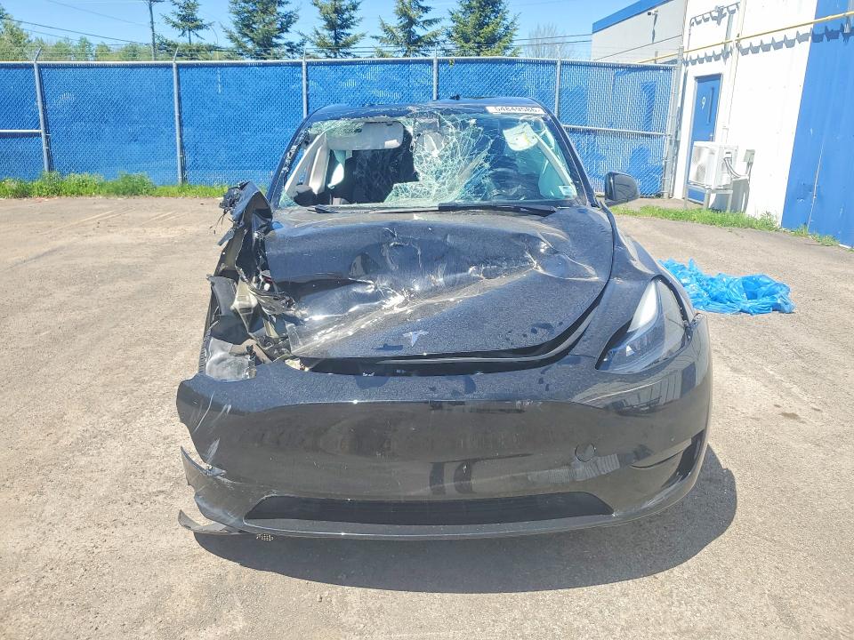 Photo 5 from auction – 2024 TESLA MODEL Y with VIN LRWYGDEE8RC670723