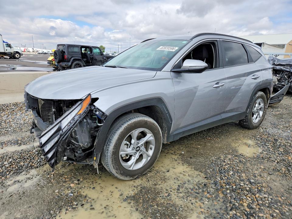 HYUNDAI TUCSON 2022 with VIN KM8JBCAE7NU032823 - Photo from auction
