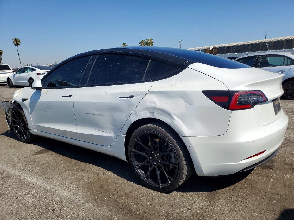 Photo 2 from auction – 2022 TESLA MODEL 3 with VIN 5YJ3E1EB9NF102355