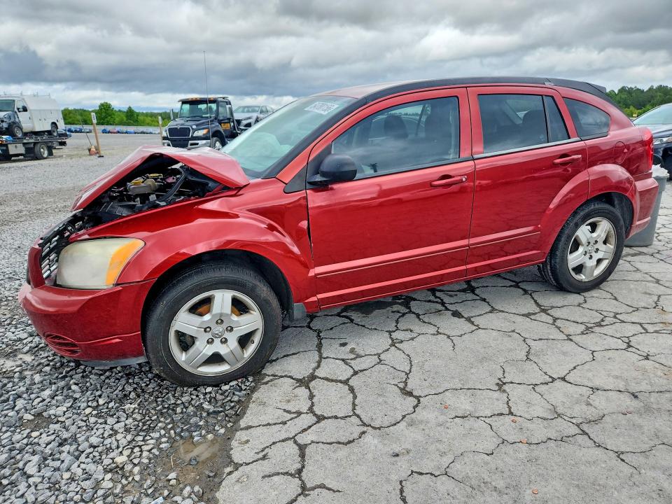 DODGE CALIBER 2009 with VIN 1B3HB48AX9D168737 - Photo from auction
