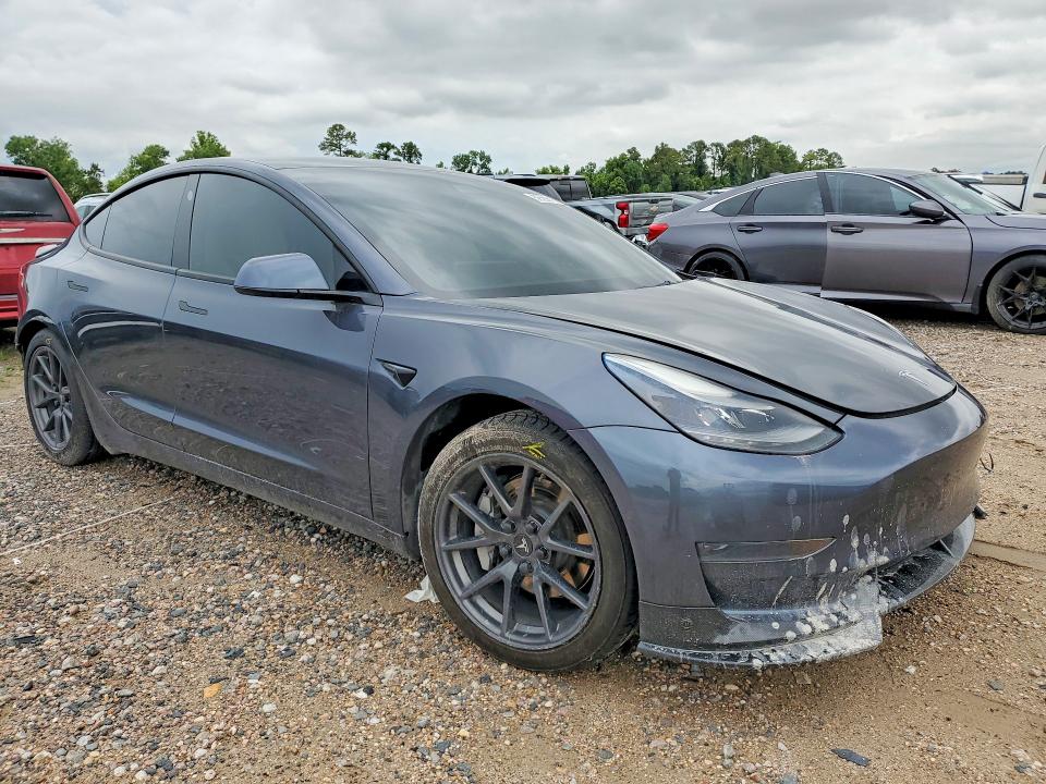 Photo 4 from auction – 2021 TESLA MODEL 3 with VIN 5YJ3E1EA9MF096059