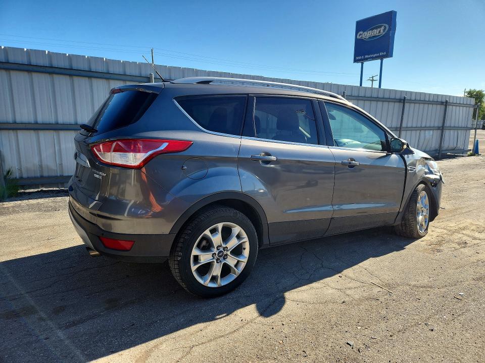 Photo 3 from auction – 2014 FORD ESCAPE with VIN 1FMCU9J92EUC85783