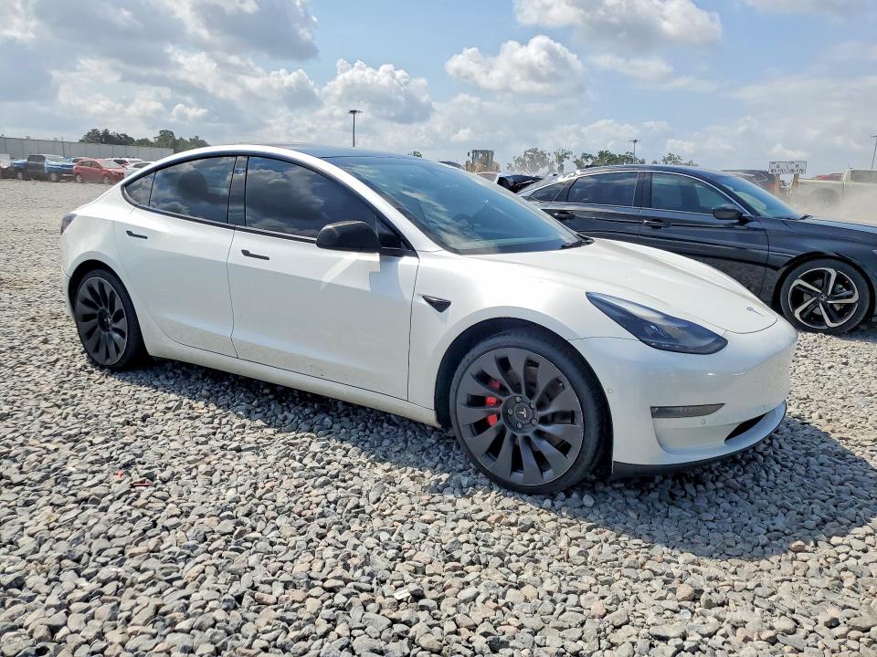 Photo 4 from auction – 2022 TESLA MODEL 3 with VIN 5YJ3E1EC1NF197308