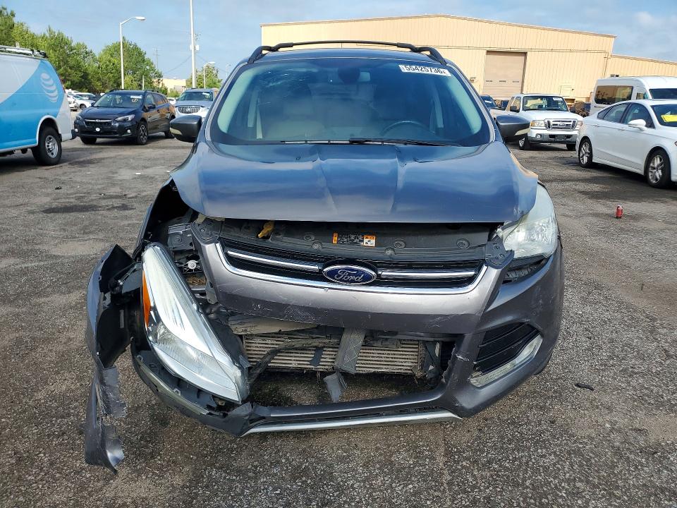 Photo 5 from auction – 2013 FORD ESCAPE with VIN 1FMCU0H97DUD48568