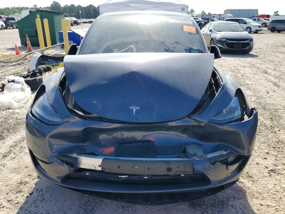 Photo 5 from auction – 2023 TESLA MODEL Y with VIN 7SAYGDEF4PF882369
