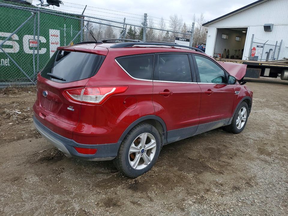 Photo 3 from auction – 2016 FORD ESCAPE with VIN 1FMCU9GX3GUB27235