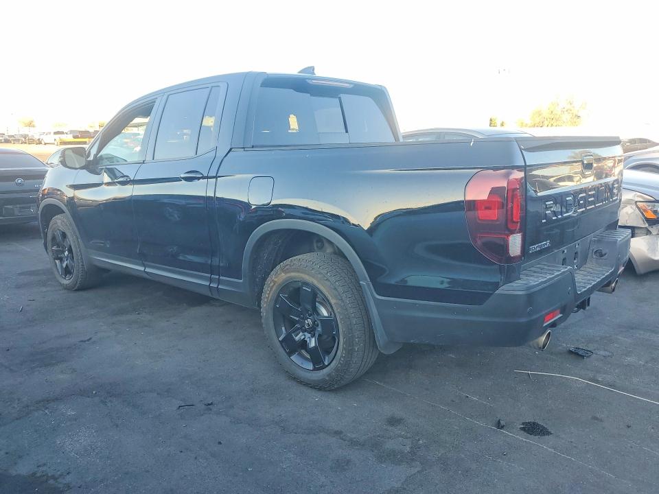 Photo 2 from auction – 2025 HONDA RIDGELINE with VIN 5FPYK3F80SB031045