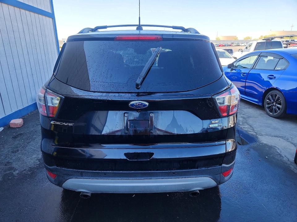 Photo 6 from auction – 2017 FORD ESCAPE with VIN 1FMCU9GD0HUB34716