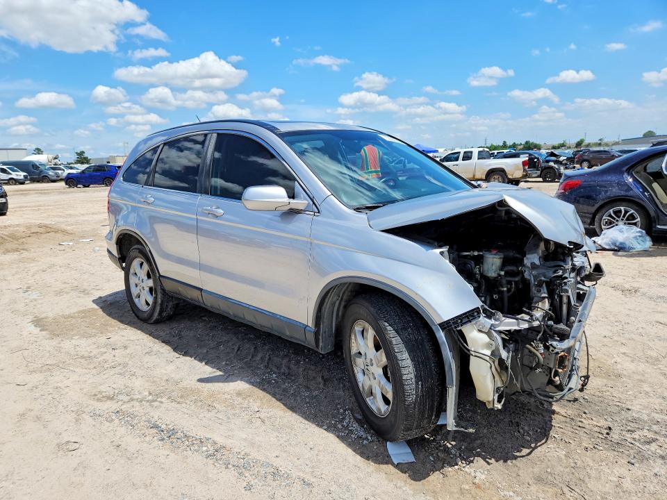 Photo 4 from auction – 2008 HONDA CR-V with VIN JHLRE38768C031049