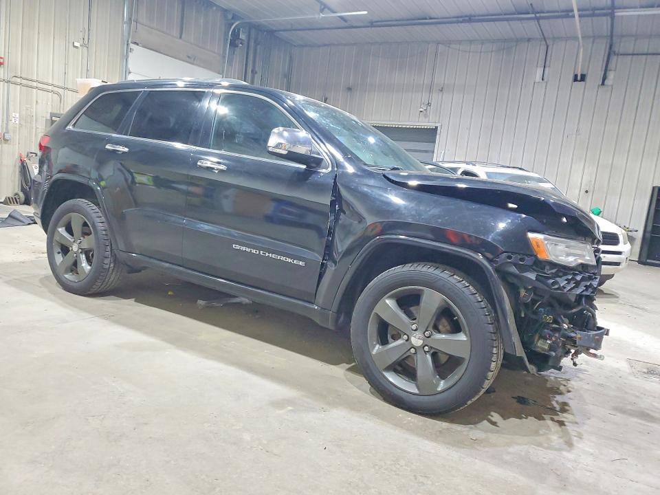 Photo 4 from auction – 2014 JEEP GRAND CHEROKEE with VIN 1C4RJFCG9EC129229
