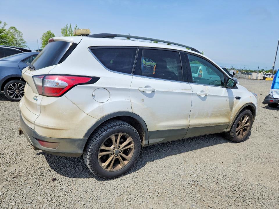 Photo 3 from auction – 2018 FORD ESCAPE with VIN 1FMCU9GD6JUC60603