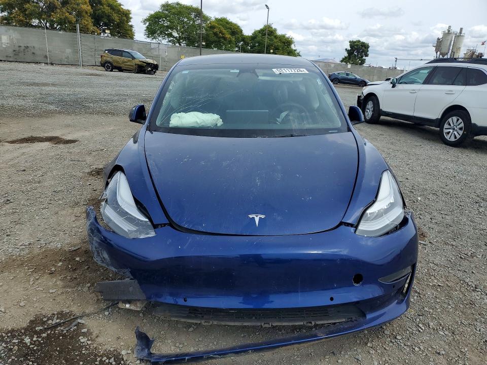 Photo 5 from auction – 2022 TESLA MODEL 3 with VIN 5YJ3E1EB0NF243556