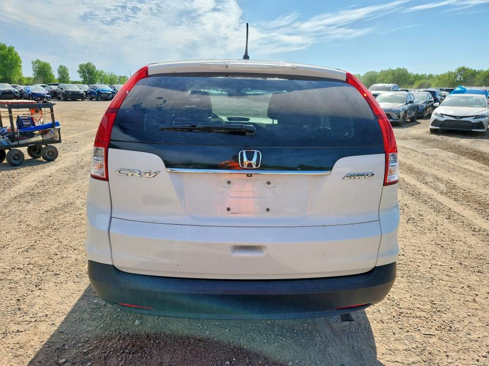 Photo 6 from auction – 2014 HONDA CR-V with VIN 5J6RM4H54EL100993