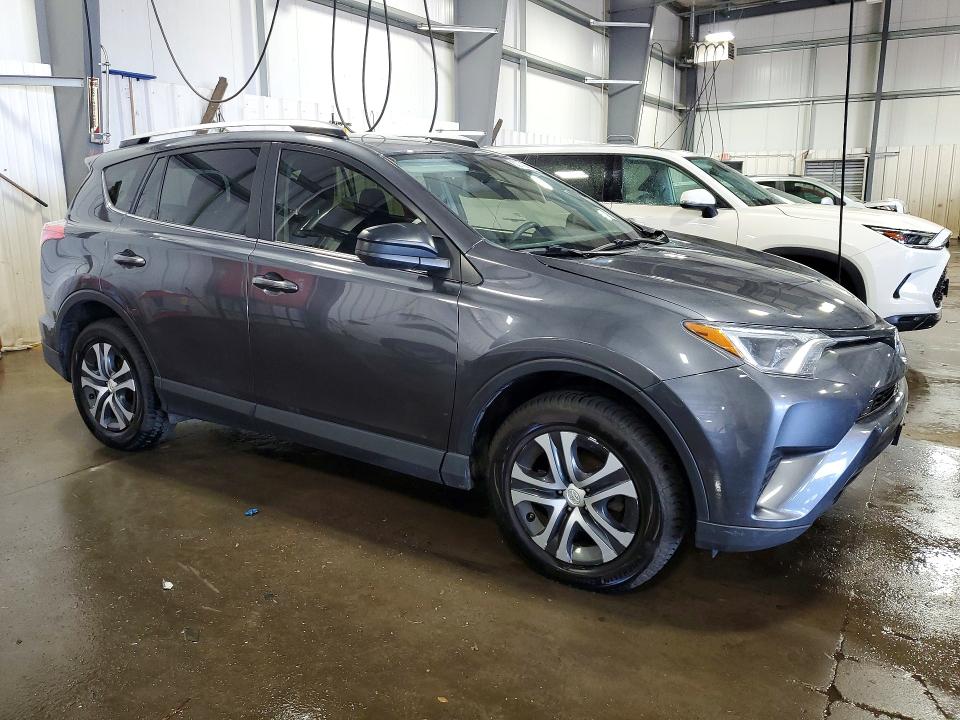 Photo 4 from auction – 2016 TOYOTA RAV4 with VIN JTMBFREV6GD188302
