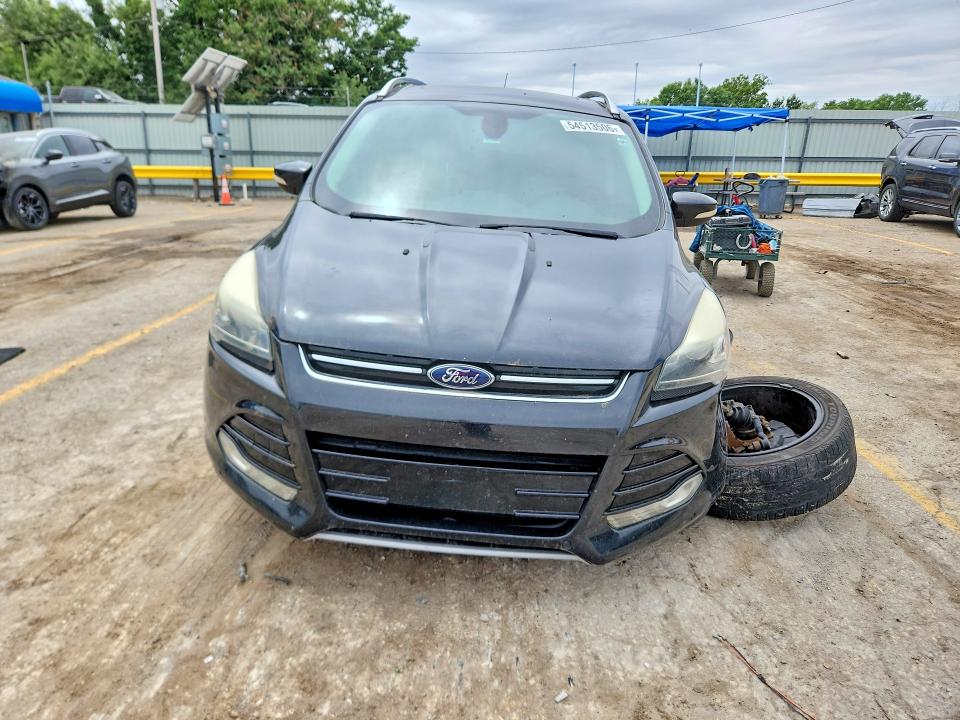 Photo 5 from auction – 2015 FORD ESCAPE with VIN 1FMCU0JX1FUA17335