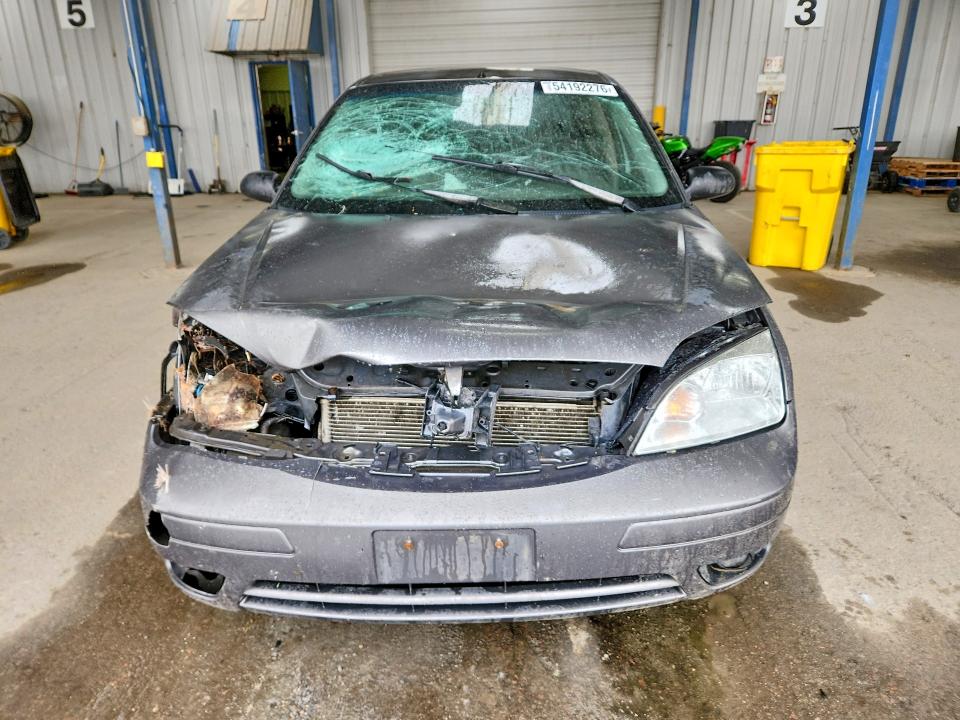 Photo 5 from auction – 2007 FORD FOCUS with VIN 1FAFP34N57W237156