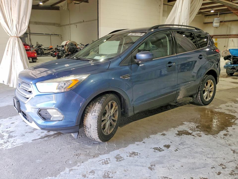 FORD ESCAPE 2018 with VIN 1FMCU9HD5JUA02829 - Photo from auction