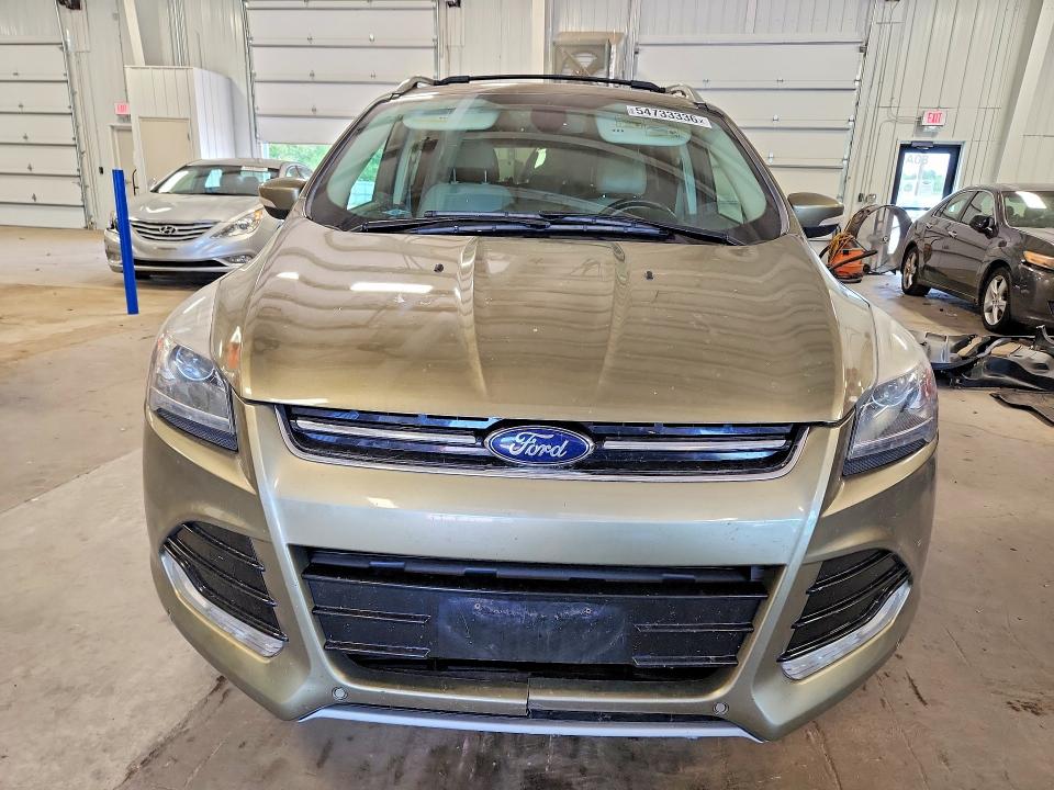 Photo 5 from auction – 2014 FORD ESCAPE with VIN 1FMCU9JX6EUA13610