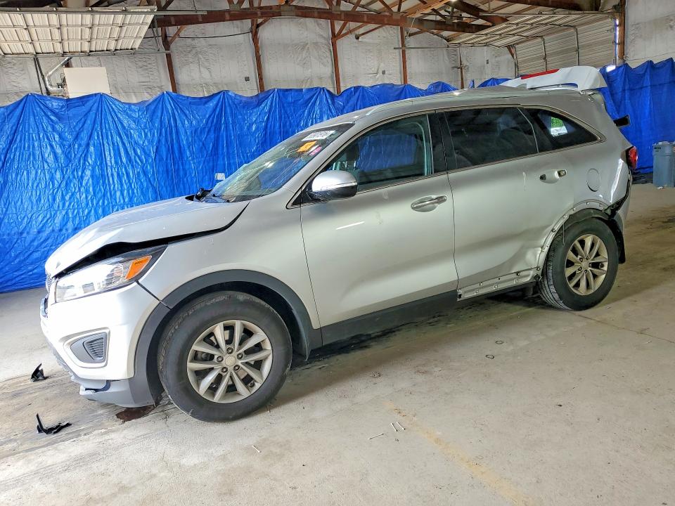 KIA SORENTO 2016 with VIN 5XYPG4A32GG094218 - Photo from auction