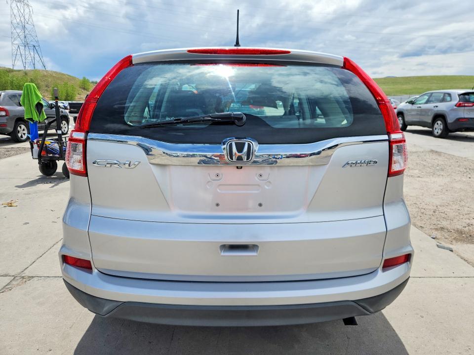 Photo 6 from auction – 2015 HONDA CR-V with VIN 2HKRM4H39FH612792