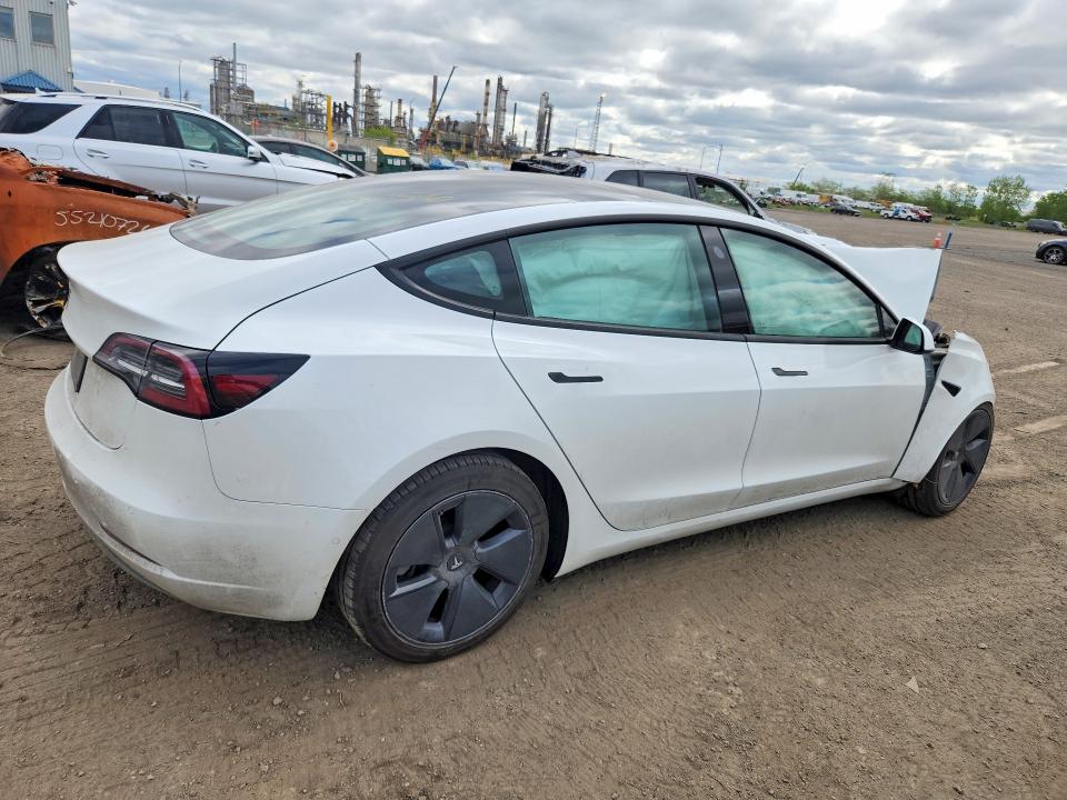 Photo 3 from auction – 2022 TESLA MODEL 3 with VIN 5YJ3E1EA3NF249164