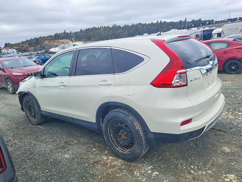 Photo 2 from auction – 2015 HONDA CR-V with VIN 2HKRM4H42FH123420