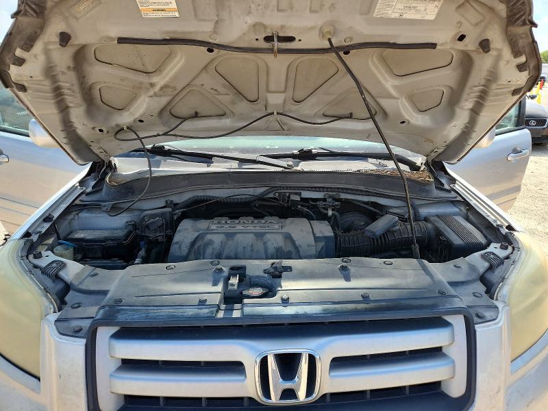 Photo 12 from auction – 2006 HONDA PILOT with VIN 2HKYF18726H528580