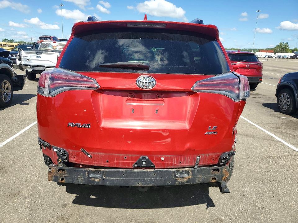 Photo 6 from auction – 2016 TOYOTA RAV4 with VIN JTMBFREV5GJ084742