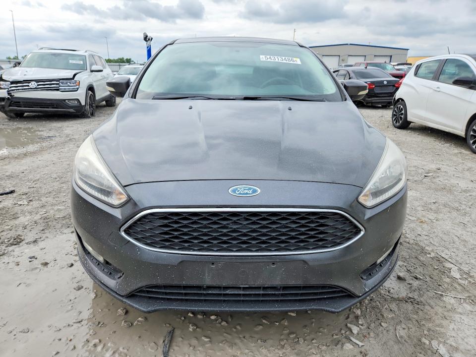 Photo 5 from auction – 2015 FORD FOCUS with VIN 1FADP3F28FL348312
