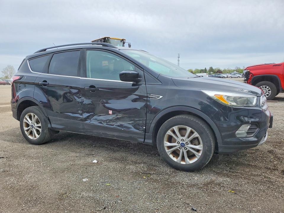 Фото 4 с аукциона – 2017 FORD ESCAPE с VIN 1FMCU9GD8HUE58819