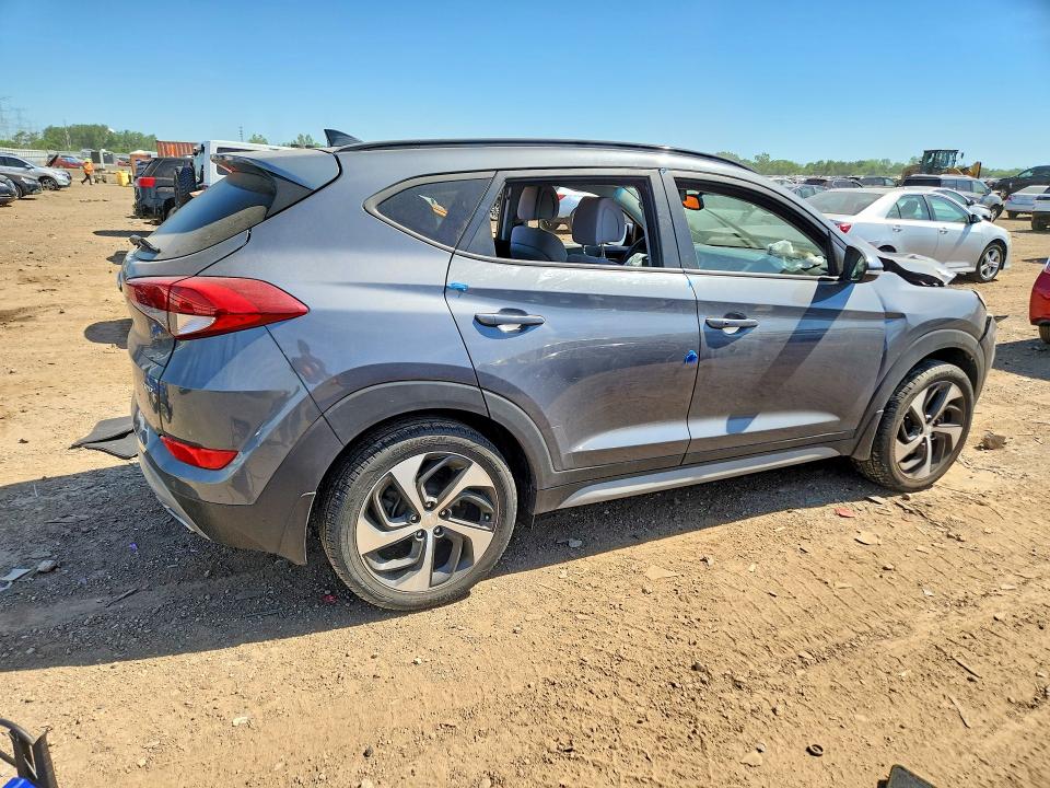 Photo 3 from auction – 2018 HYUNDAI TUCSON with VIN KM8J3CA26JU677573
